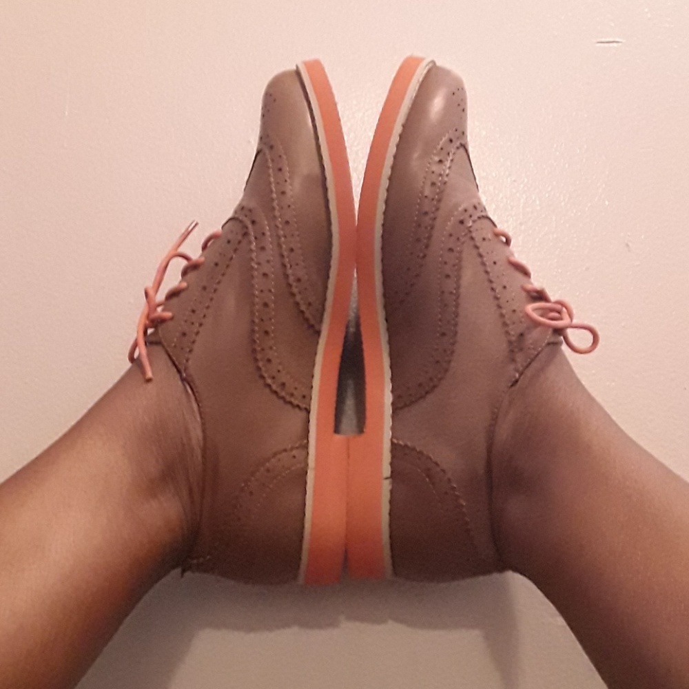 Brown and orange page boy shoes